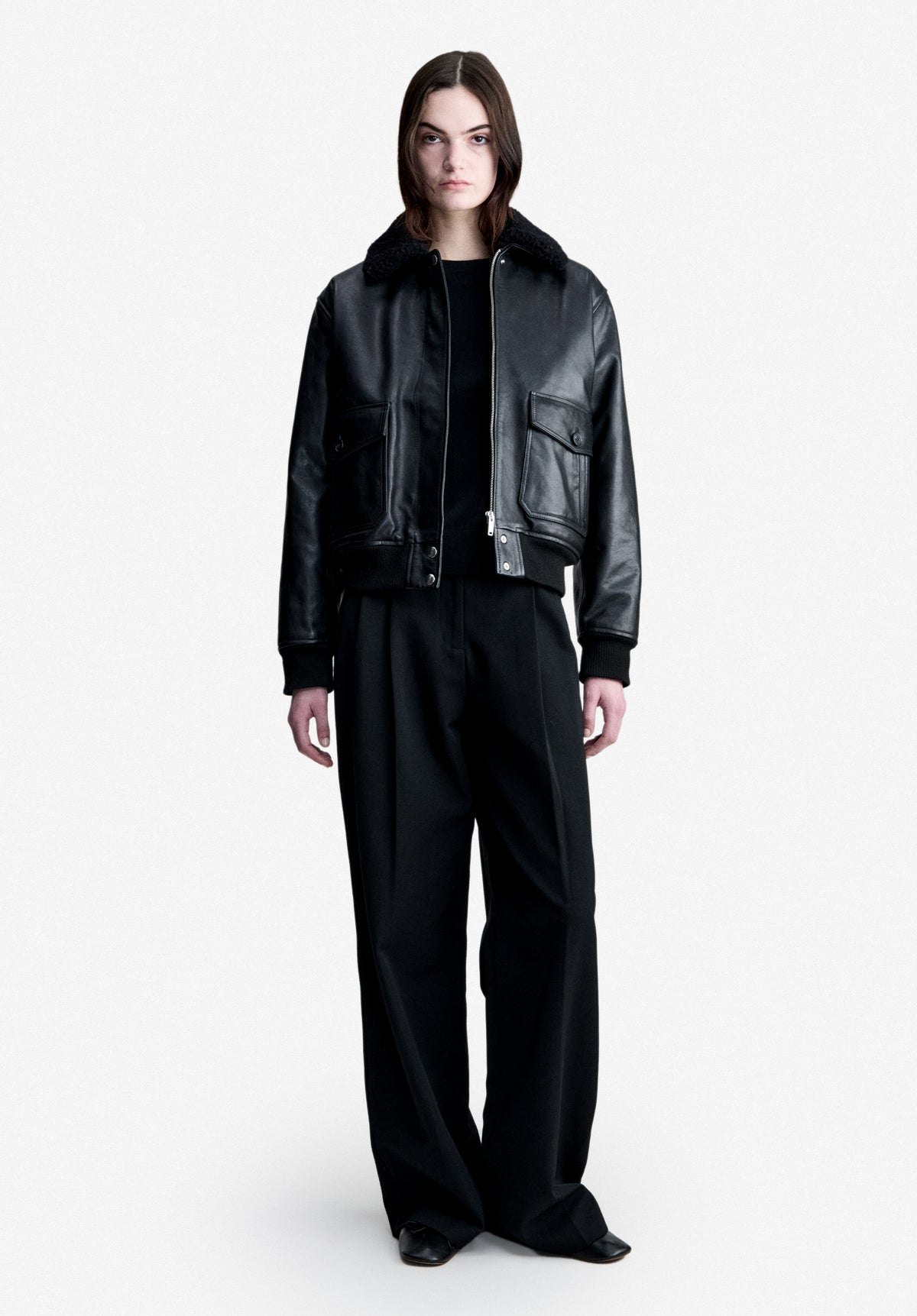 Loose-fit black cotton trousers - 1